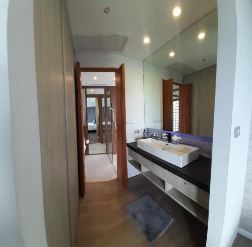 Modern bathroom with large mirror and double sinks