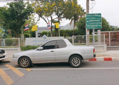 Street view with a car parked outside