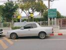 Street view with a car parked outside