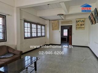 Living room with natural light and wall art