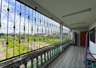 Balcony with railing and countryside view