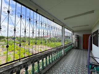 Balcony with railing and countryside view