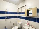 Bathroom with blue and white tiles