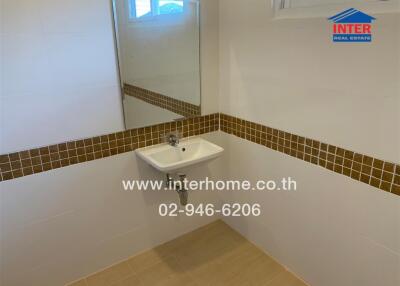 Bathroom with sink and mirror