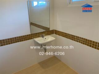 Bathroom with sink and mirror