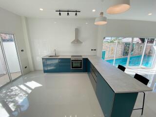 Modern kitchen with pool view