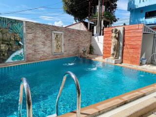 Outdoor pool with decorative elements and clear water