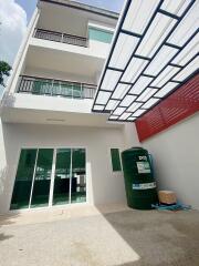 Exterior of the building with a covered patio