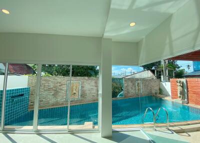 View of the pool area from inside the house