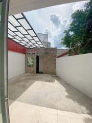 Outdoor courtyard with covered area