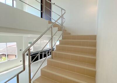 Staircase with modern stainless steel railings