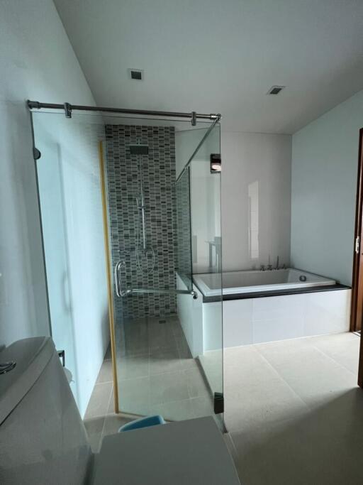 Modern bathroom with shower and bathtub