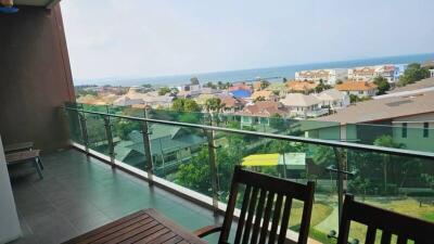Balcony with ocean view and surrounding neighborhood