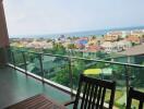 Balcony with ocean view and surrounding neighborhood