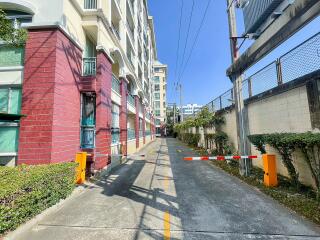 Entrance to residential building with security gate