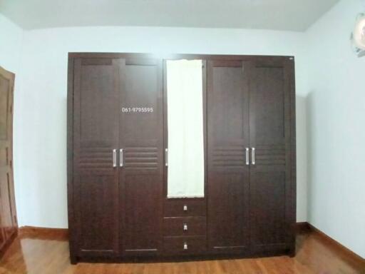 Spacious wardrobe in bedroom