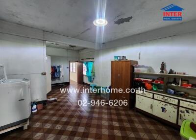 Laundry area with appliances and storage