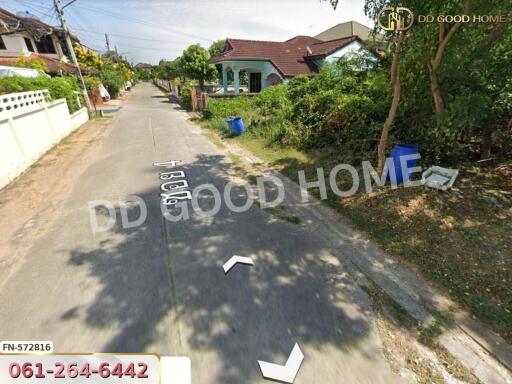 Street view of a residential area with houses