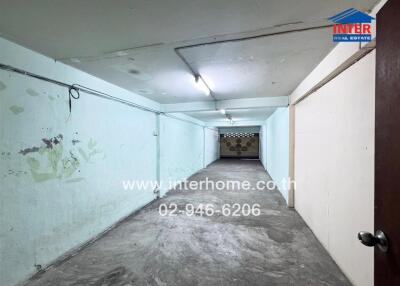 Storage room with concrete floor and ceiling lights