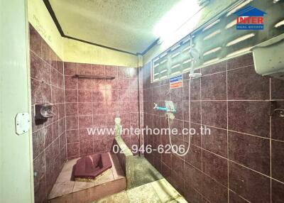 Shower area with intricate tile design