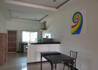 Modern kitchen and dining area with minimalistic decor
