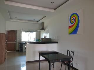 Modern kitchen and dining area with minimalistic decor