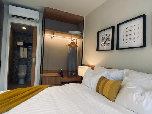 Modern bedroom with a view into the bathroom