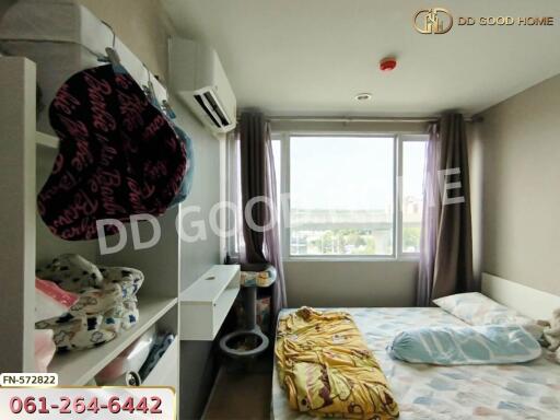 Bedroom with large window and natural light