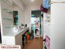 Bedroom with mirror cabinet and storage shelves