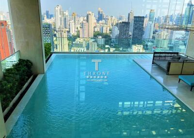 Luxury apartment with a swimming pool overlooking the city skyline