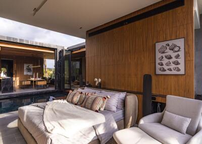 Modern bedroom with pool view