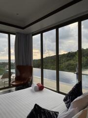 Bedroom with pool and panoramic view