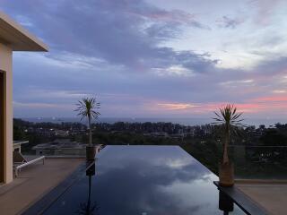 Rooftop area with infinity pool and panoramic view