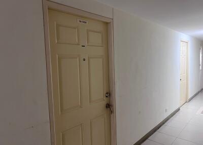 hallway with beige doors