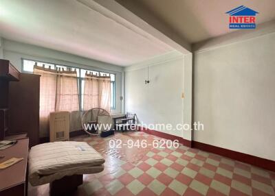 Unfurnished living room with tiled floor and natural light