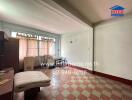 Unfurnished living room with tiled floor and natural light