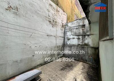 Outdoor space with concrete walls and floor