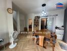 Dining area with modern wooden furniture and contemporary chandelier