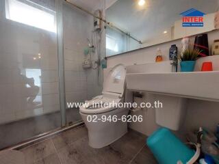 Bathroom with standing shower and modern fixtures