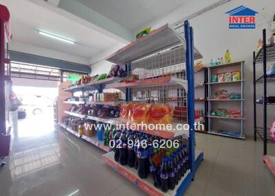 Interior view of a convenience store with stocked shelves