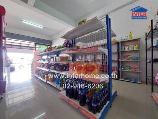 Interior view of a convenience store with stocked shelves