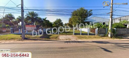 Front view of a property with a fenced yard