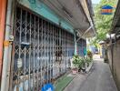 Exterior view of a building with metal gate