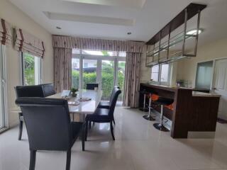 Modern dining area with attached kitchen