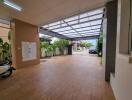 Covered carport with ample space and gate entrance