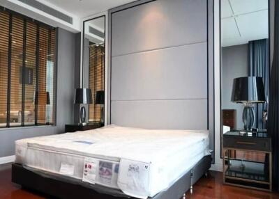 Modern bedroom with large bed and stylish decor