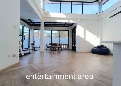 Spacious entertainment area with natural light
