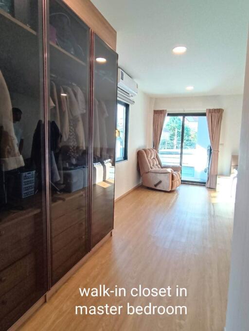 Walk-in closet in master bedroom