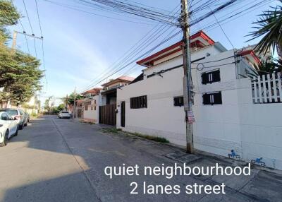 A quiet neighborhood with two-lane street view