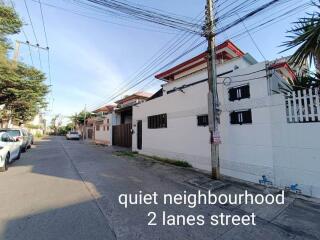 A quiet neighborhood with two-lane street view